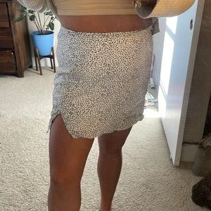 Polka dot mini skirt with slit detail zipper on the side NWT